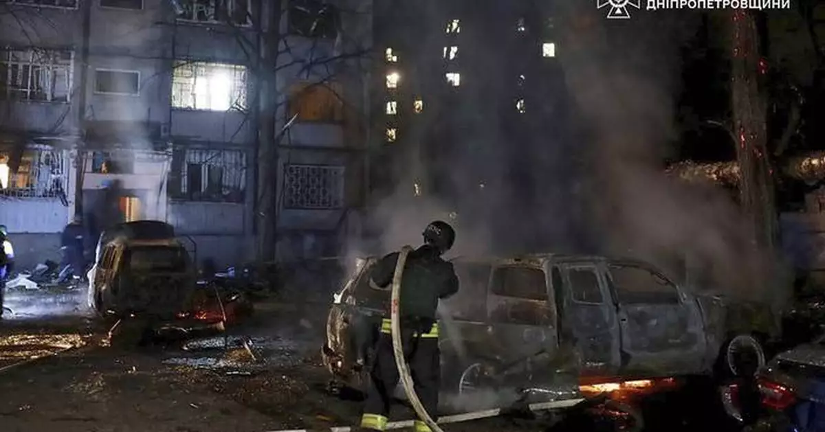 Russia strikes Ukrainian city of Dnipro as Kyiv seeks security pledges in Paris