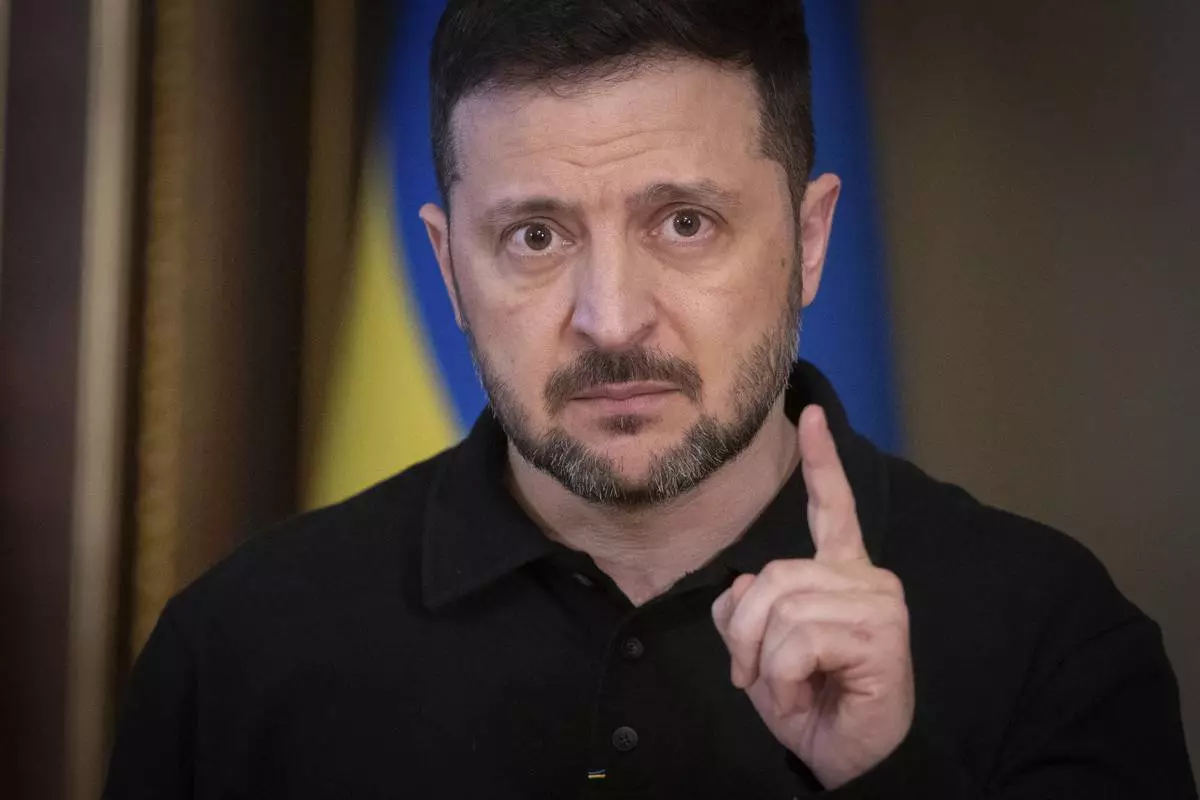 Ukrainian President Volodymyr Zelenskyy speaks during a briefing in Kyiv, Ukraine, Thursday, April 17, 2025. (AP Photo/Efrem Lukatsky)