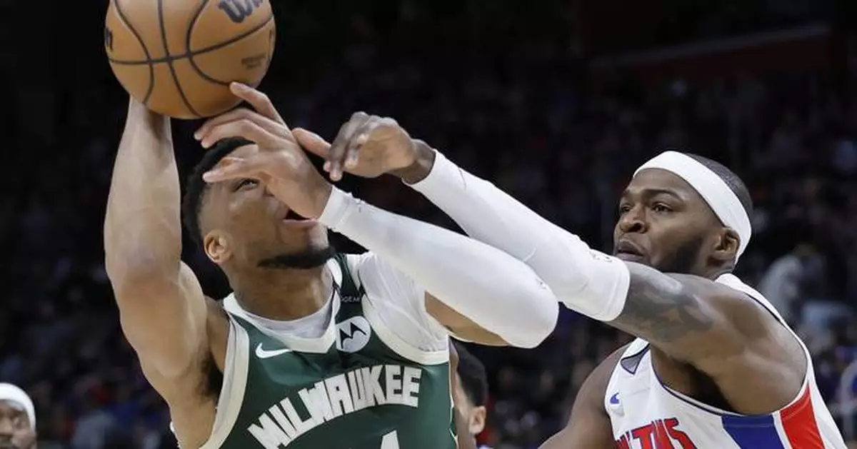 Antetokounmpo's 11th triple-double lifts Bucks to 125-119 win over Pistons to secure No. 5 seed