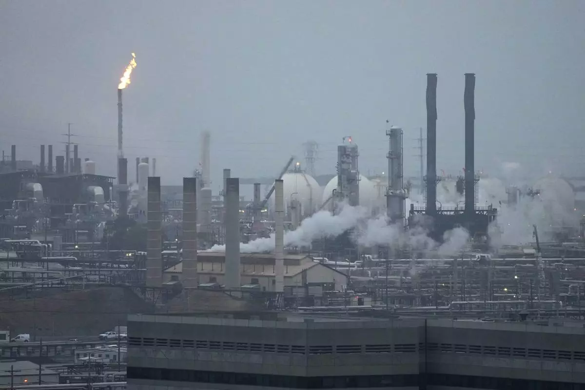 FILE - The Chevron Richmond Refinery in this view from Point Richmond, Calif., Tuesday, Oct. 24, 2023. (AP Photo/Eric Risberg, File)
