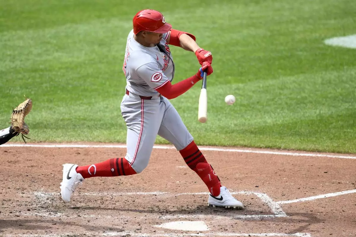 Cincinnati Reds' Noelvi Marte hits a RBI double during the fourth inning of a baseball game against the Baltimore Orioles, Sunday, April 20, 2025, in Baltimore. (AP Photo/Nick Wass)