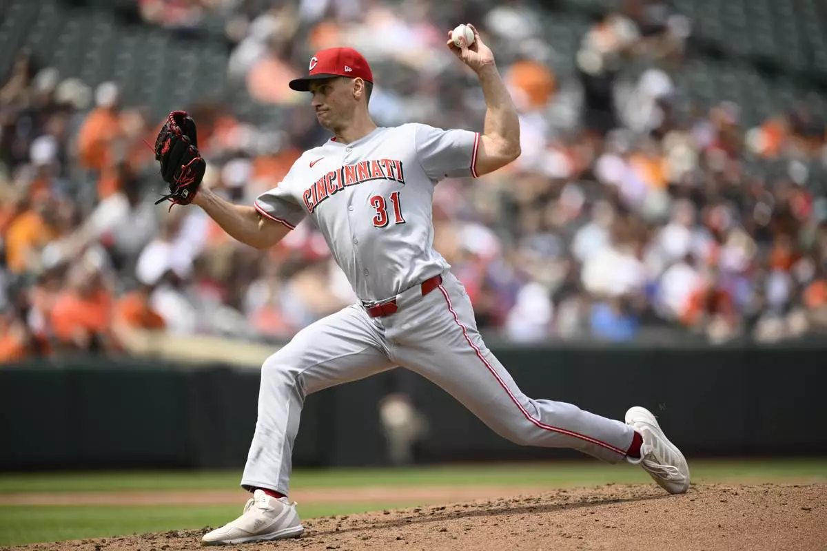 Cincinnati Reds starting pitcher Brent Suter throws during the second inning of a baseball game against the Baltimore Orioles, Sunday, April 20, 2025, in Baltimore. (AP Photo/Nick Wass)