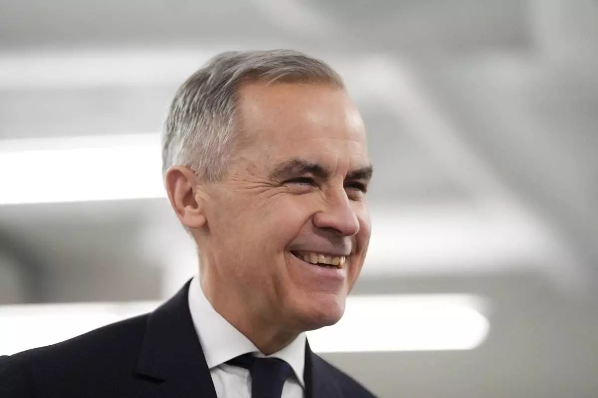 FILE - Canada Liberal Leader Mark Carney visits the Sheridan College Police Foundations department in Brampton, Ontario, Canada, April 10, 2025. (Sean Kilpatrick/The Canadian Press via AP, File)