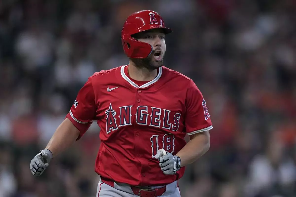 Los Angeles Angels' Nolan Schanuel runs the bases after hitting a solo home run during the second inning of a baseball game against the Houston Astros, Sunday, April 13, 2025, in Houston. (AP Photo/Kevin M. Cox)