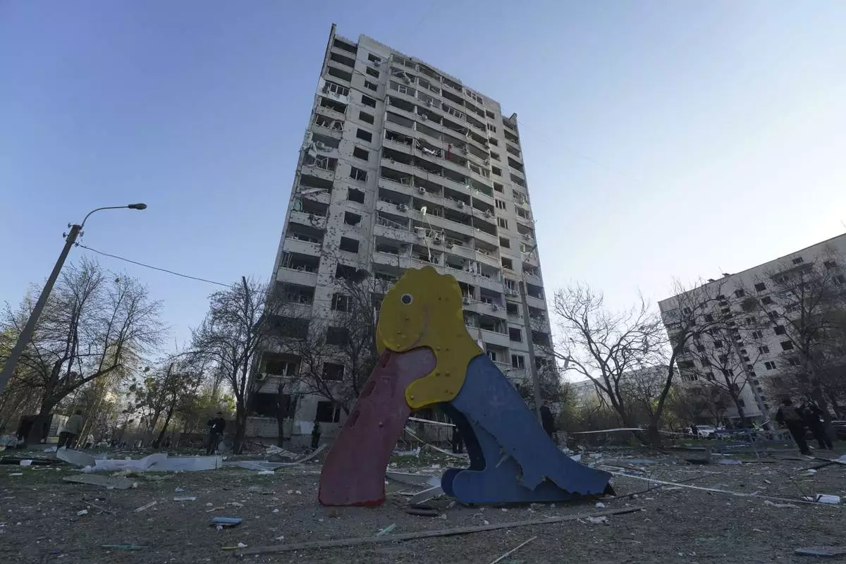 A residential building damaged by a Russian strike in Kharkiv, Ukraine, Friday April 18, 2025. (AP Photo/Andrii Marienko)