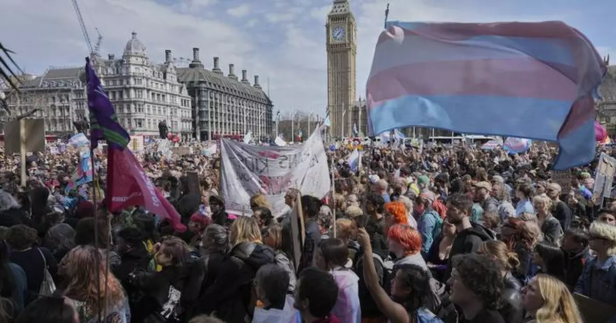 Thousands gather in London to support trans rights following UK ruling over definition of woman