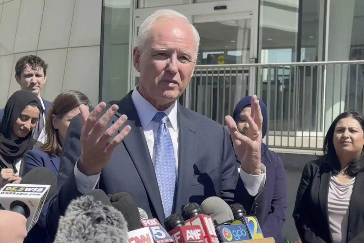In this image taken from video, immigration lawyer Charles Kuck speaks to reporters outside a federal courthouse in Atlanta, on April 17, 2025. (AP Photo/Kate Brumback)