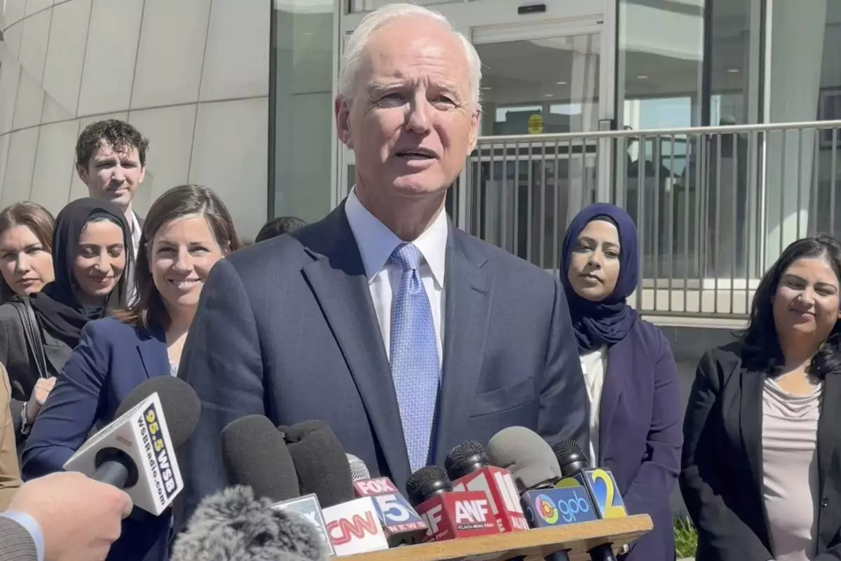 In this image taken from video, immigration lawyer Charles Kuck speaks to reporters outside a federal courthouse in Atlanta, on April 17, 2025. (AP Photo/Kate Brumback)