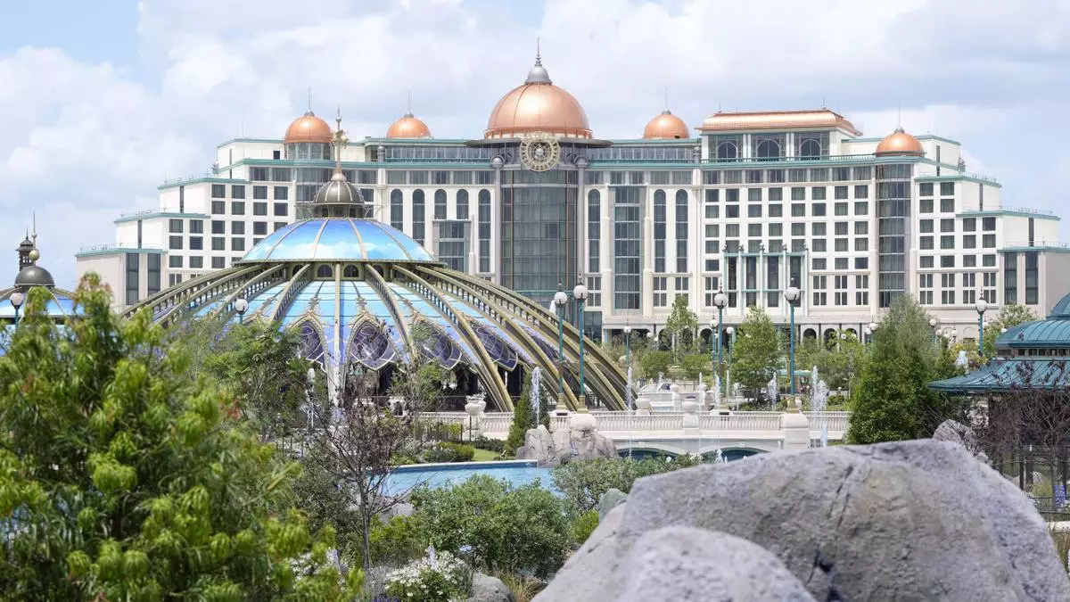 The Universal Helios Grand Hotel overlooking Celestial Park at Epic Universe Theme Park is seen at Universal Resort Orlando Thursday, April 10, 2025, in Orlando, Fla. (AP Photo/John Raoux)