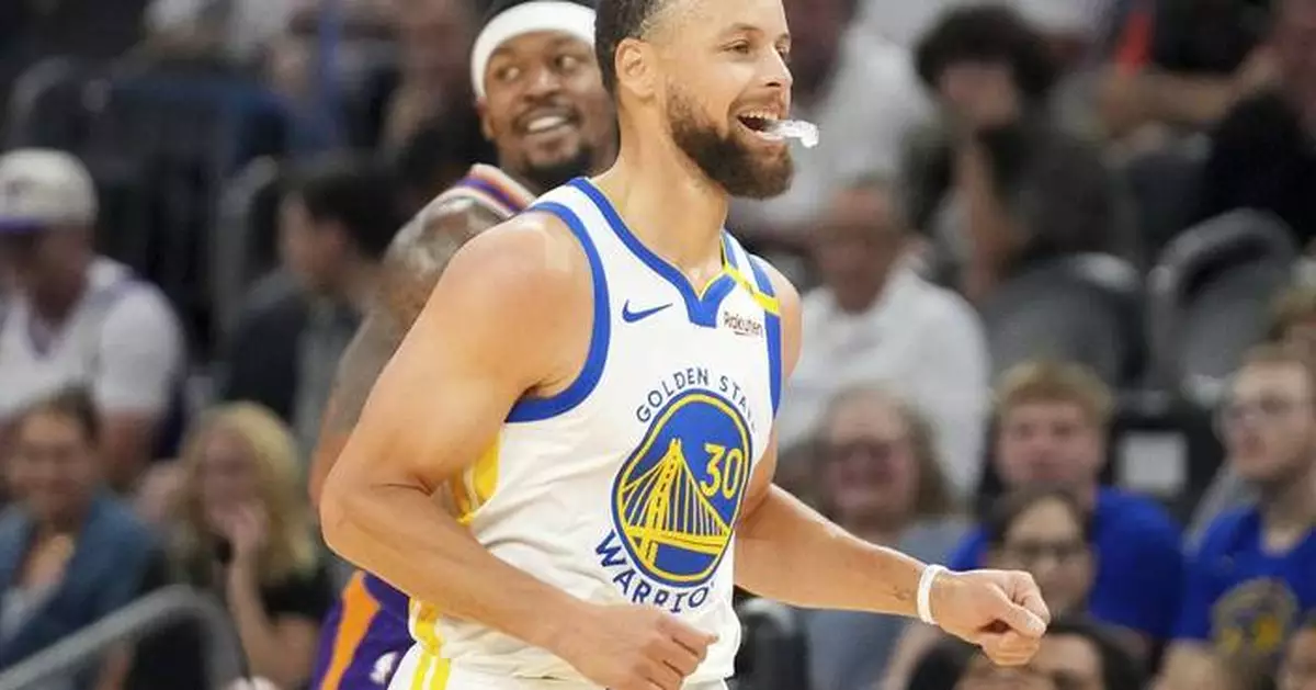 Curry scores 25 as the Warriors cruise past the Suns 133-95 and keep pace in West playoff race