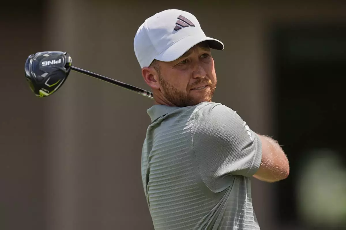 Daniel Berger watches his drive on the third hole during the final round of the RBC Heritage golf tournament, Sunday, April 20, 2025, in Hilton Head Island, S.C. (AP Photo/Mike Stewart)