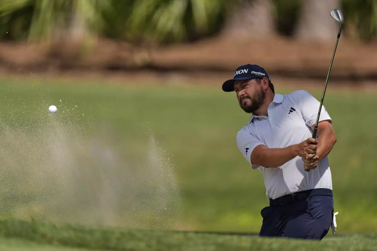 Andrew Novak hits from the bunker on the seventh hole during the final round of the RBC Heritage golf tournament, Sunday, April 20, 2025, in Hilton Head Island, S.C. (AP Photo/Mike Stewart)