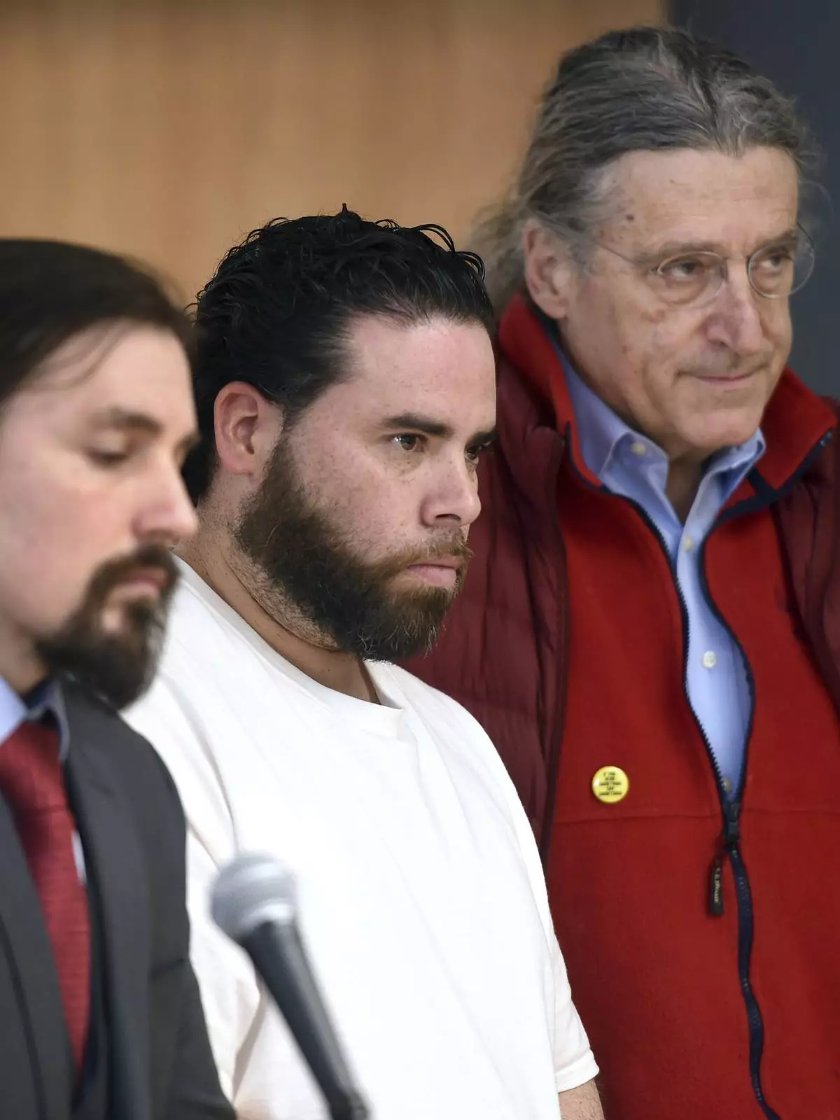 Jose Morales, center, appears for a bond hearing with attorneys Kevin Smith, left, and Norm Pattis at Derby Superior Courthouse in Derby, Conn., Friday, Feb. 7, 2020. (Arnold Gold/New Haven Register via AP, file)