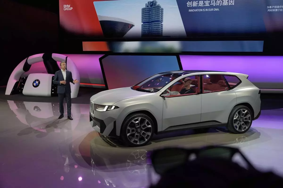 Oliver Zipse, Chairman of the board of management of BMW AG, speaks during a press conference for BMW at the Shanghai auto show, Wednesday, April 23, 2025. (AP Photo/Ng Han Guan)