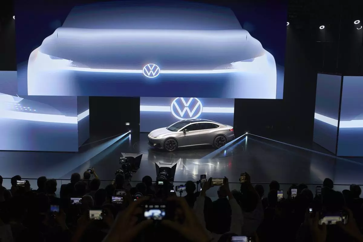 A concept car is shown during the Volkswagen Group media night ahead of the Auto Show in Shanghai, Tuesday, April 22, 2025. (AP Photo/Ng Han Guan)