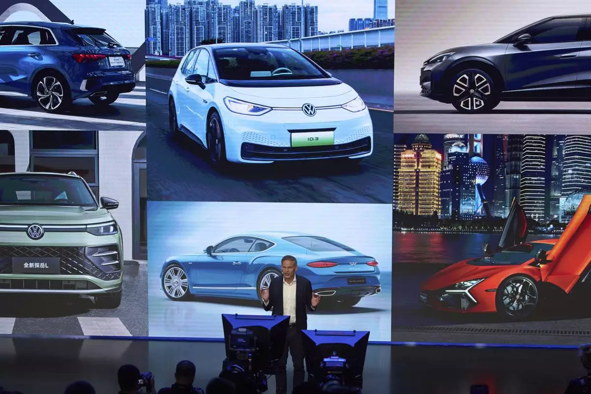 Olive Blume, Chairman of the Board of Management of Volkswagen Group speaks during a media night ahead of the Auto Show in Shanghai, Tuesday, April 22, 2025. (AP Photo/Ng Han Guan)