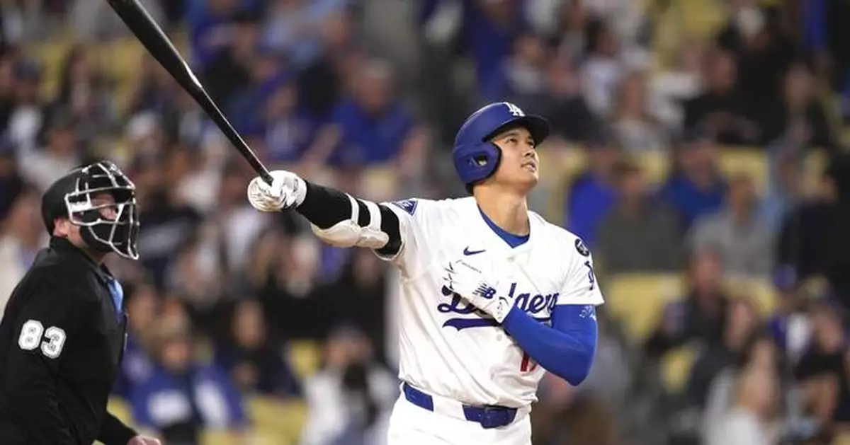Ohtani hits 448-foot homer in 7-run 1st inning, Dodgers hold on for 8-7 win to sweep Rockies