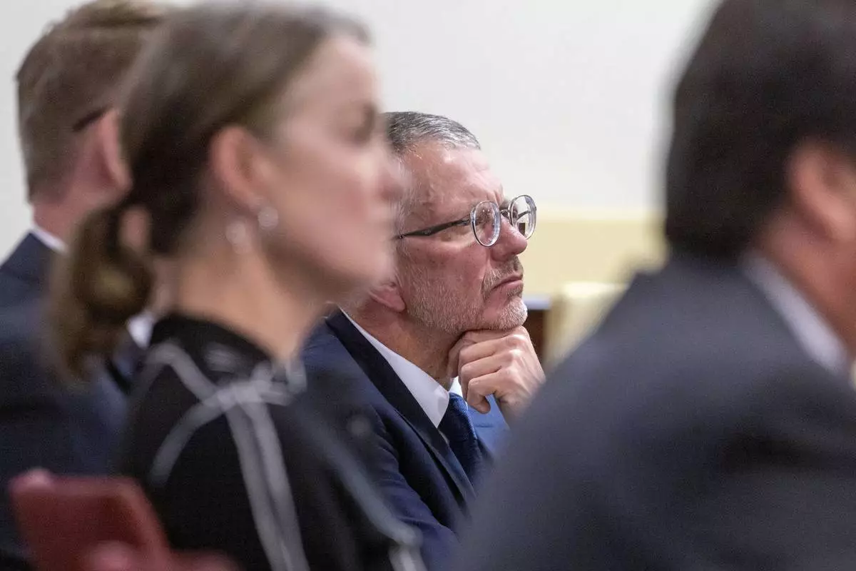 Greg MacKenzie, attorney for the Hackman children, listens to Judge Matthew J. Wilson in District Court regarding the release of public records in the deaths of actor Gene Hackman and his wife, Betsy Arakawa in Santa Fe, N.M., Monday, March 31, 2025. (Michael G. Seamans/Santa Fe New Mexican via AP, Pool)