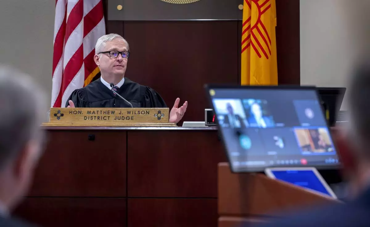 First District Judge Matthew Wilson listens to arguments during a hearing for an injunction to prevent the release of photos and other evidence related to the death of the actor Gene Hackman and his wife Betty Arakawa Hackman in a court hearing in Santa Fe, N.M. Monday, March 31, 2025. (Eddie Moore/The Albuquerque Journal via AP)