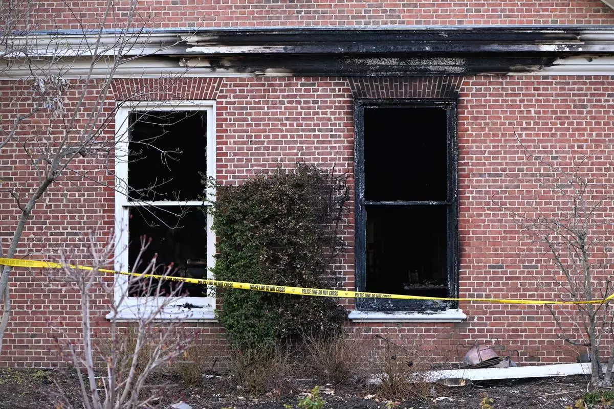 Charred wood trim and brick are visible at the Pennsylvania governor's official residence after a man was arrested in the alleged arson that forced Gov. Shapiro, his family and guests to flee in the middle of the night on the Jewish holiday of Passover, Sunday, Apr. 13, 2025, in Harrisburg, Pa. (AP Photo/Marc Levy)