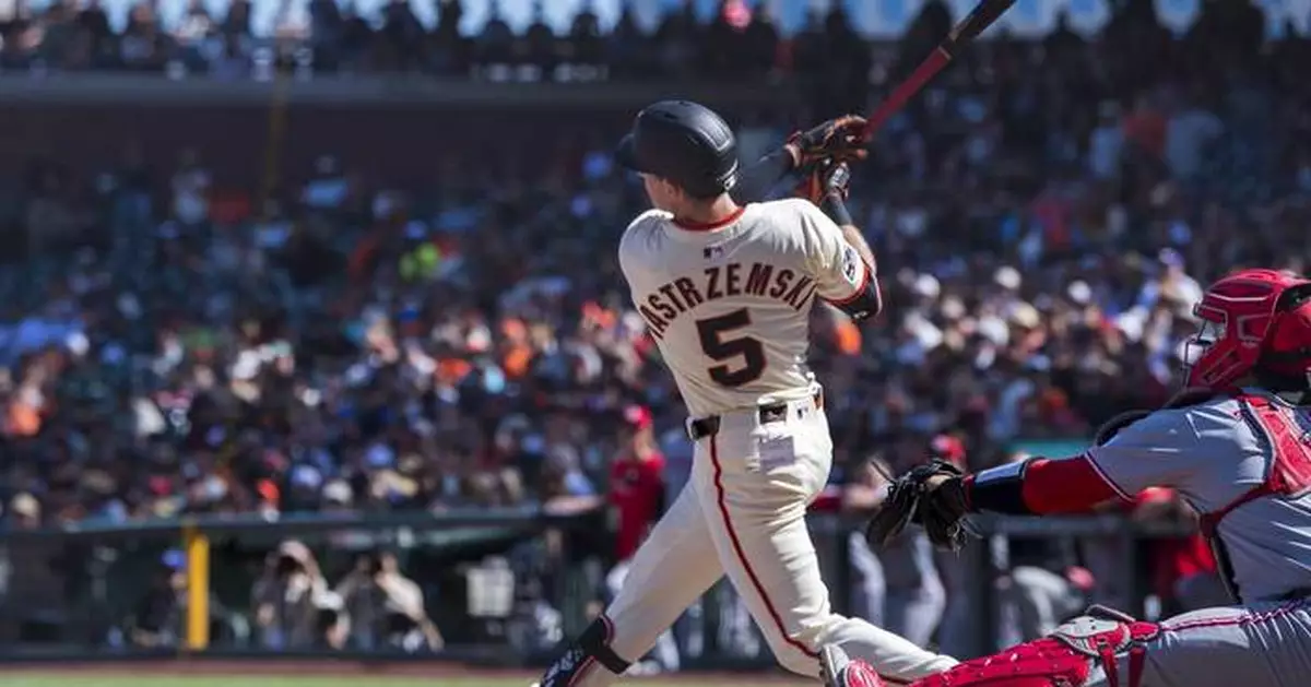 Yastrzemski hits a 2-run homer in the 10th inning and Giants top Reds 8-6