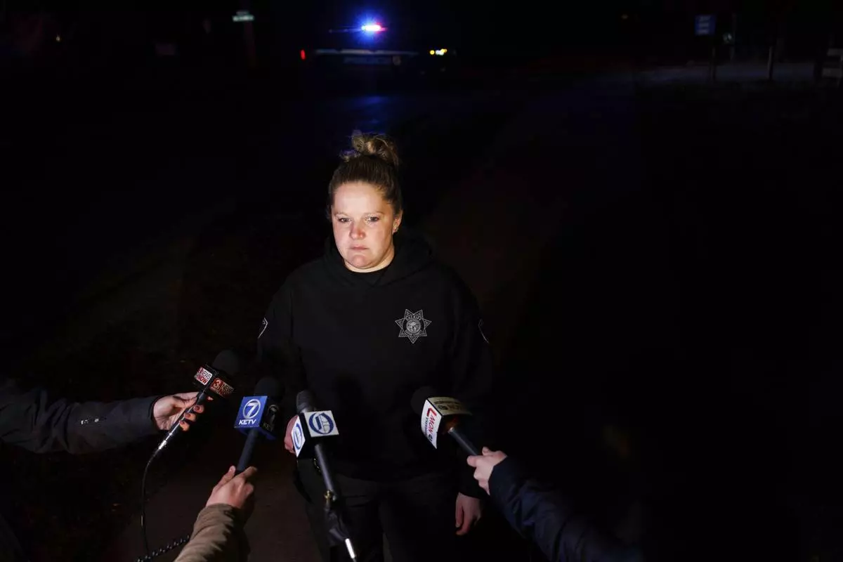 Sgt. Brie Frank, Dodge County Sheriff's Office, speaks to media after a plane crashed into the Platte River killing multiple people Friday, April 18, 2025, in Fremont, Neb. (Nikos Frazier/Omaha World-Herald via AP)
