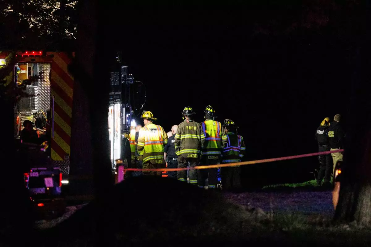 Emergency crews respond after plane crashed into the Platte River killing multiple people Friday, April 18, 2025, in Fremont, Neb. (Nikos Frazier/Omaha World-Herald via AP)