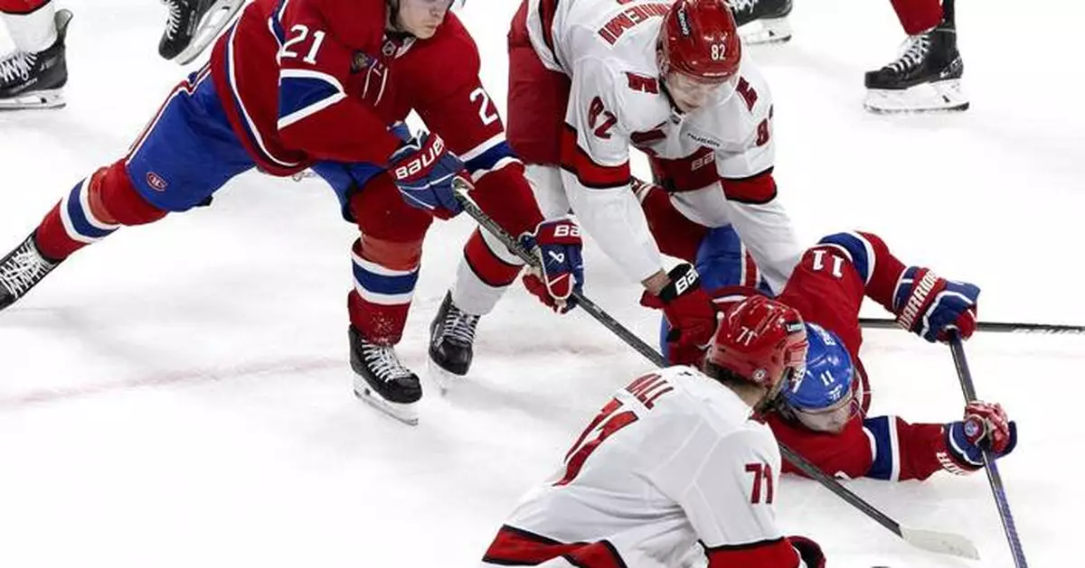 Canadiens wrap up a playoff spot, beating the Hurricanes