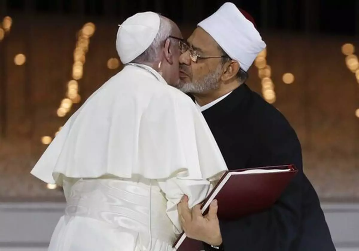 FILE - Pope Francis hugs Sheikh Ahmed el-Tayeb, the grand imam of Egypt's Al-Azhar, after an Interreligious meeting at the Founder's Memorial in Abu Dhabi, United Arab Emirates, Monday, Feb. 4, 2019. (AP Photo/Andrew Medichini, file)