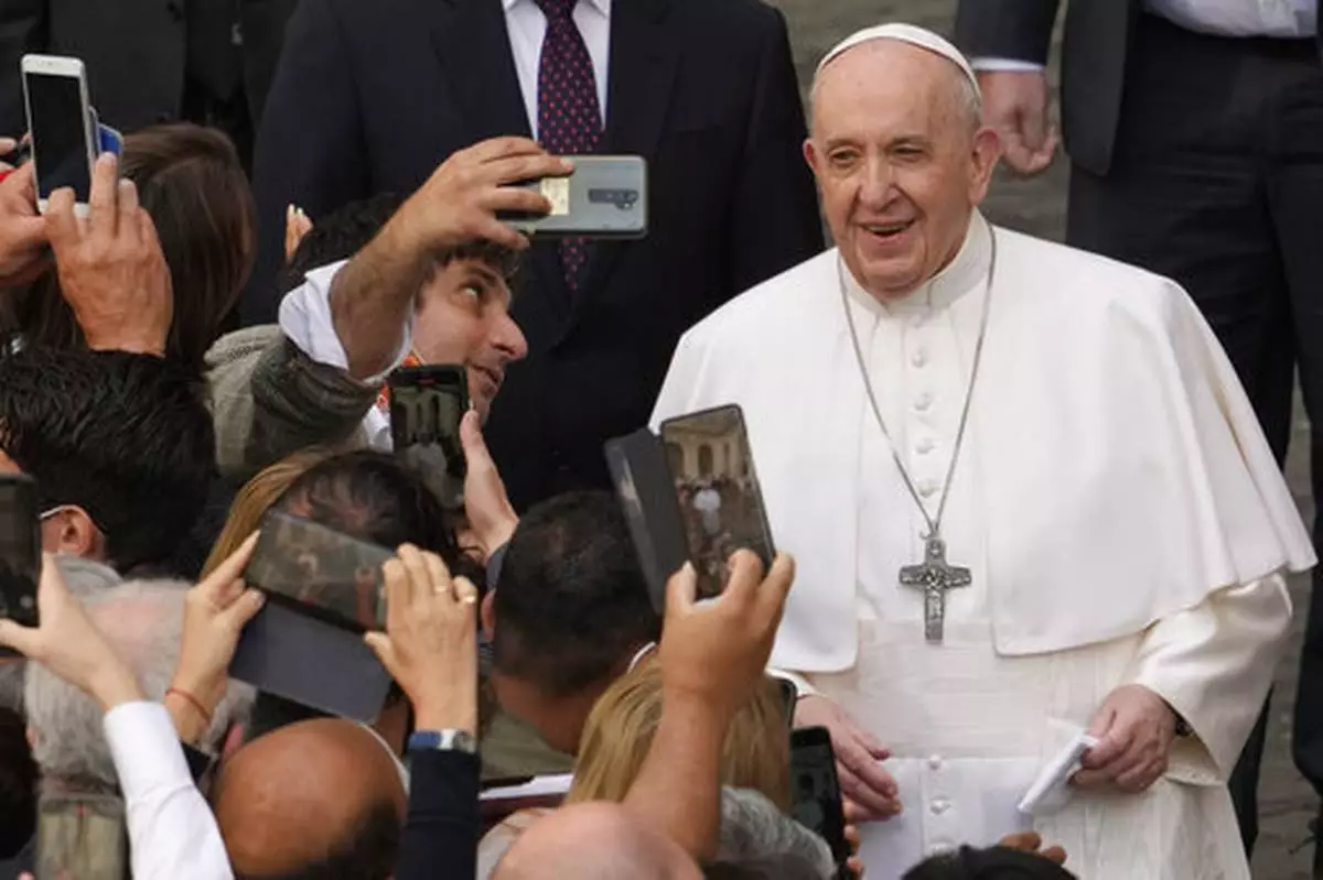 FILE - Pope Francis arrives for his weekly general audience with a limited number of faithful in the San Damaso Courtyard at the Vatican, Wednesday, June 2, 2021. (AP Photo/Andrew Medichini, file)