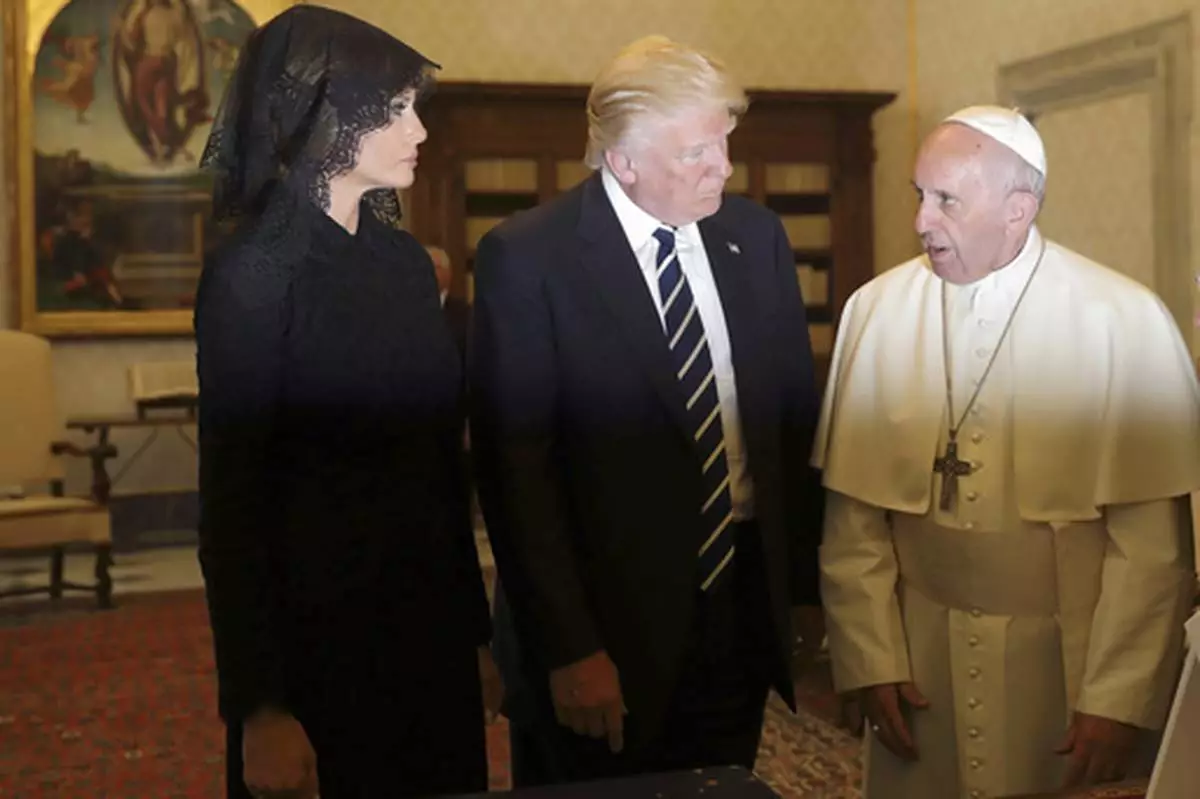 FILE - Pope Francis meets with US President Donald Trump and First lady Melania Trump on the occasion of their private audience, at the Vatican, Wednesday, May 24, 2017. (AP Photo/Alessandra Tarantino, Pool, file)