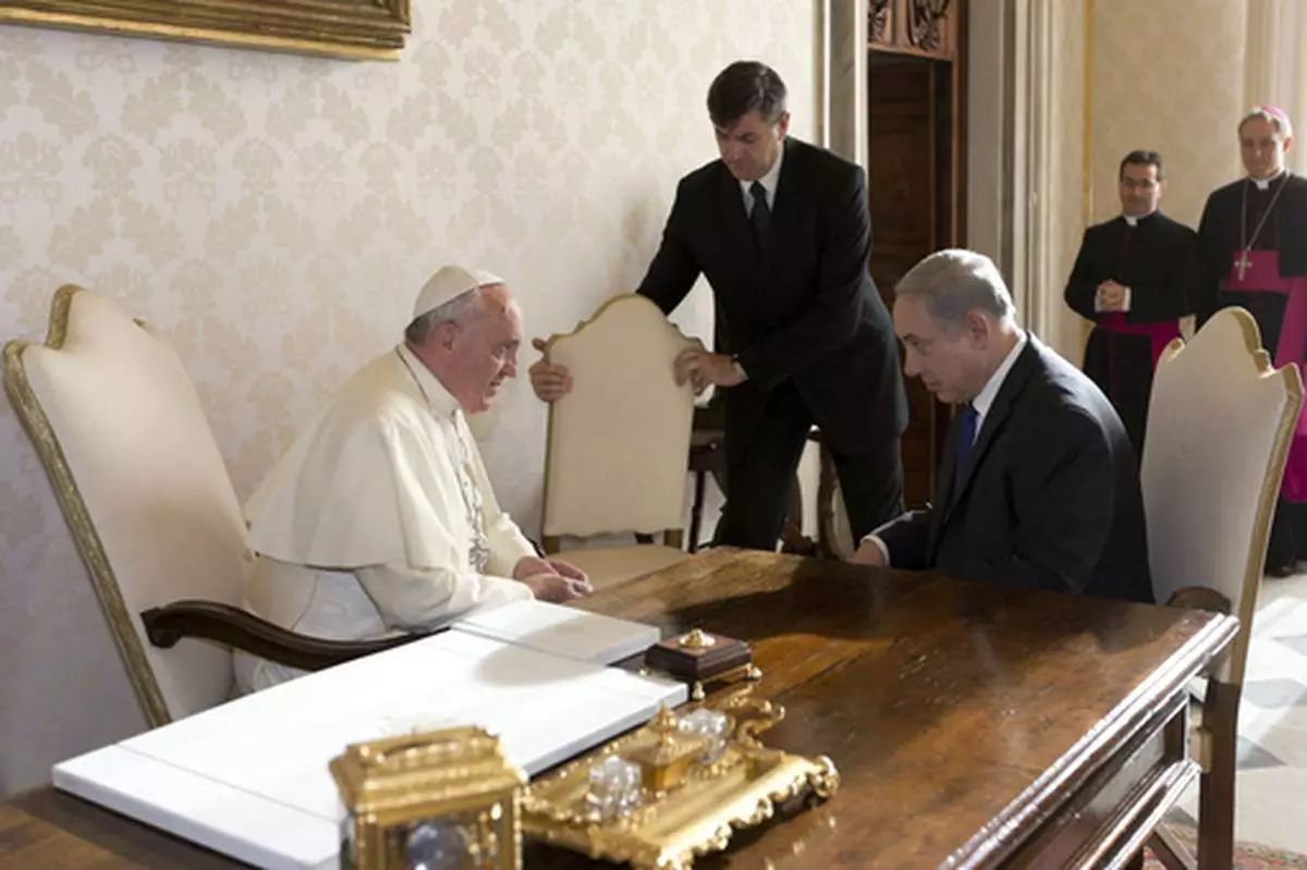 FILE - Pope Francis meets Israeli Prime Minister Benjamin Netanyahu, at the Vatican, Monday, Dec. 2, 2013. (AP Photo/Alessandra Tarantino, Pool, File)