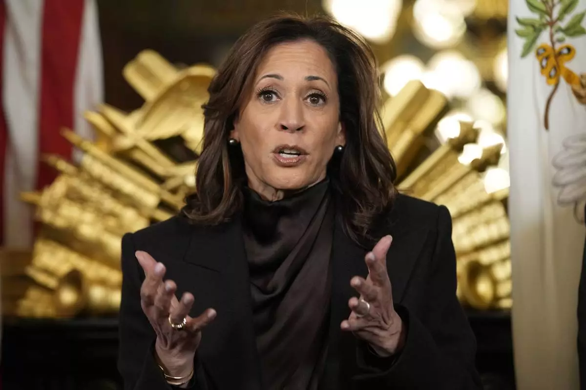 FILE - Vice President Kamala Harris speaks before signing the desk drawer in her ceremonial office, a long-standing tradition for Vice Presidents, in the Eisenhower Executive Office Building on the White House complex in Washington, Jan. 16, 2025. (AP Photo/Susan Walsh, File)