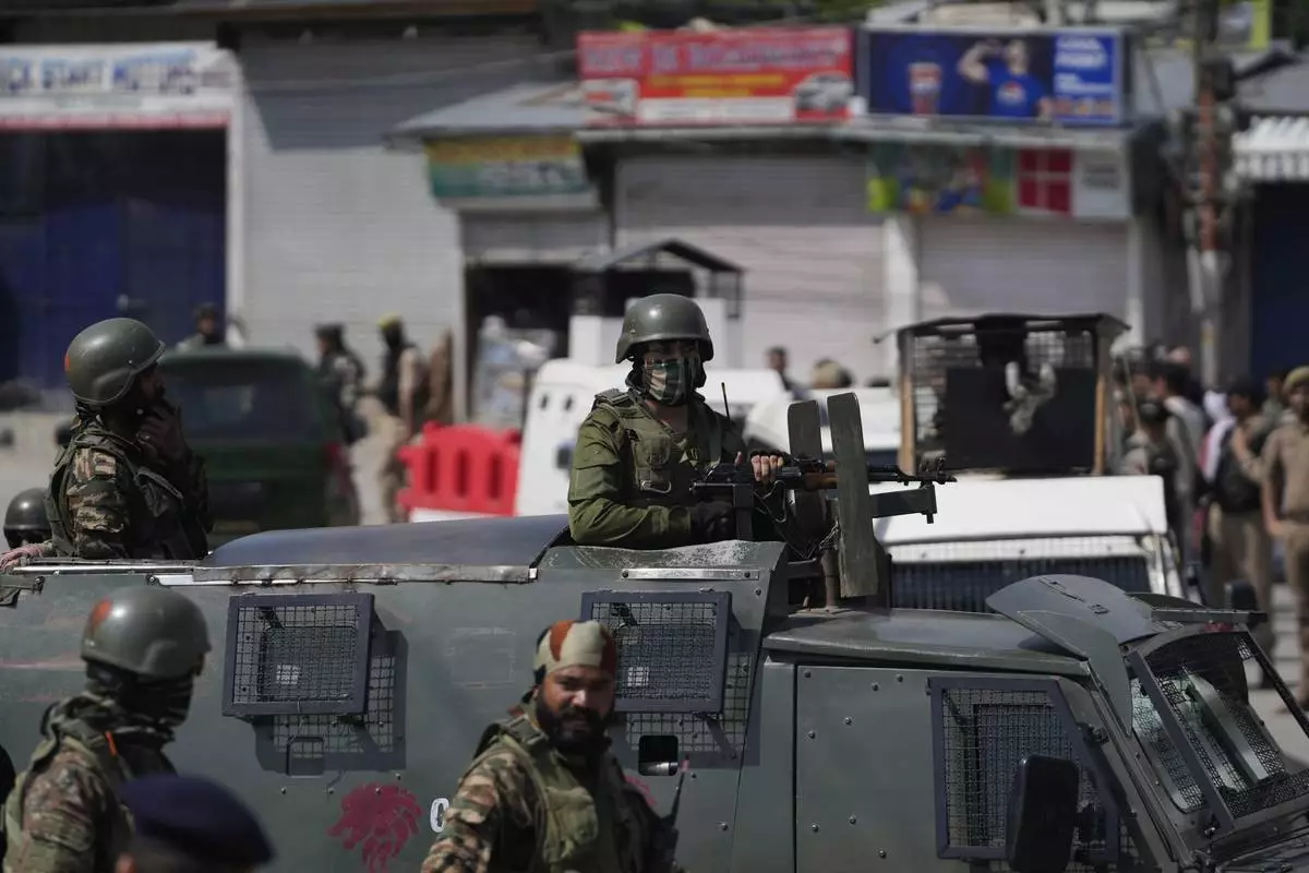 Indian soldiers guard in Srinagar, Indian controlled Kashmir, Wednesday, April. 23, 2025. (AP Photo/Mukhtar Khan)