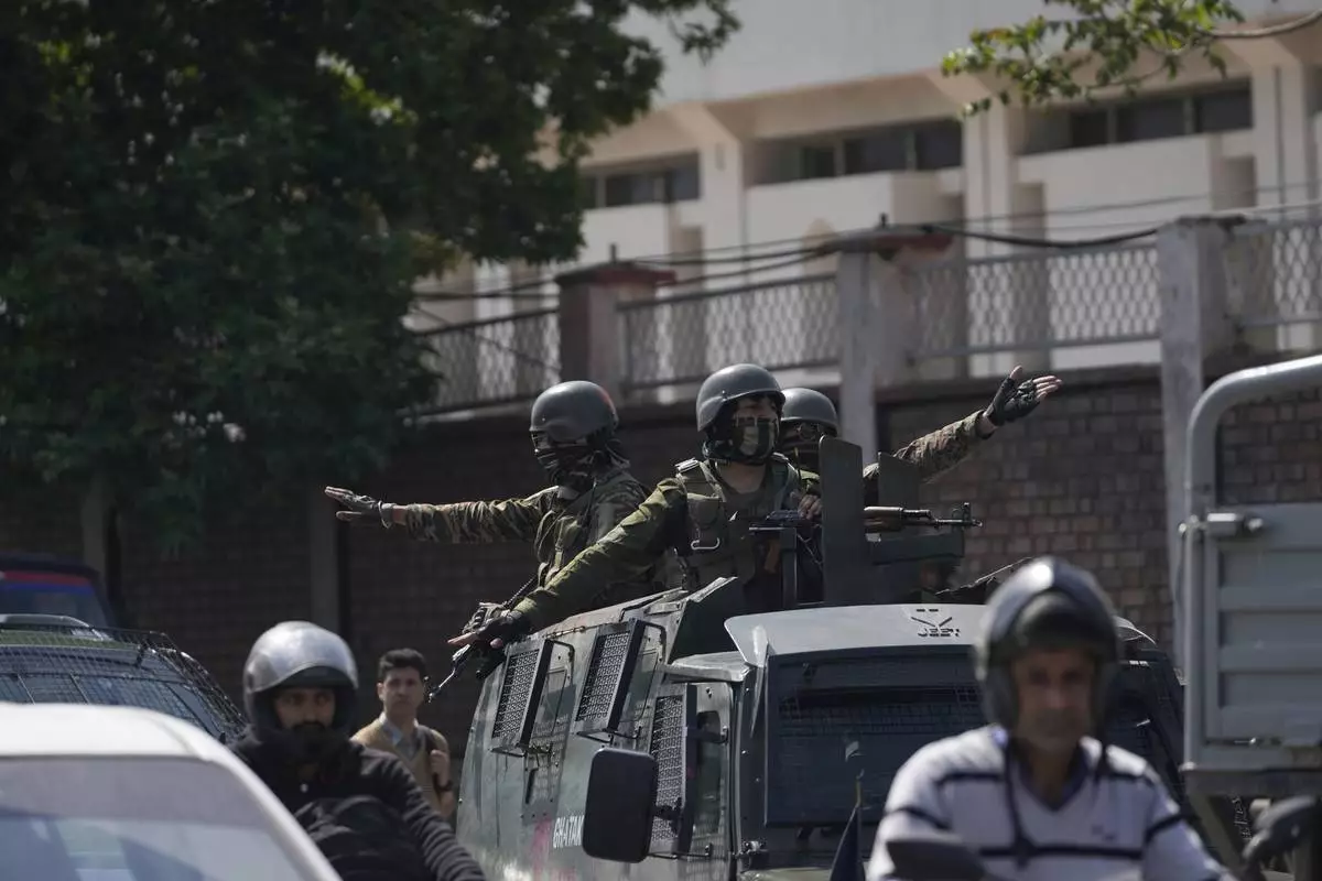 Indian soldiers guard in Srinagar, Indian controlled Kashmir, Wednesday, April. 23, 2025. (AP Photo/Mukhtar Khan)