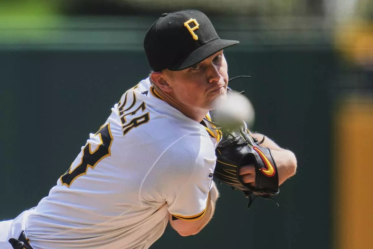 Pittsburgh Pirates pitcher Mitch Keller delivers during the first inning of a baseball game against the Cleveland Guardians in Pittsburgh, Sunday, April 20, 2025. (AP Photo/Gene J. Puskar)