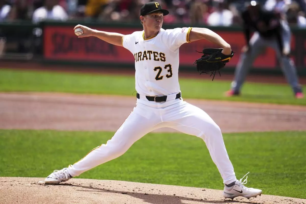 Pittsburgh Pirates pitcher Mitch Keller delivers during the first inning of a baseball game against the Cleveland Guardians in Pittsburgh, Sunday, April 20, 2025. (AP Photo/Gene J. Puskar)