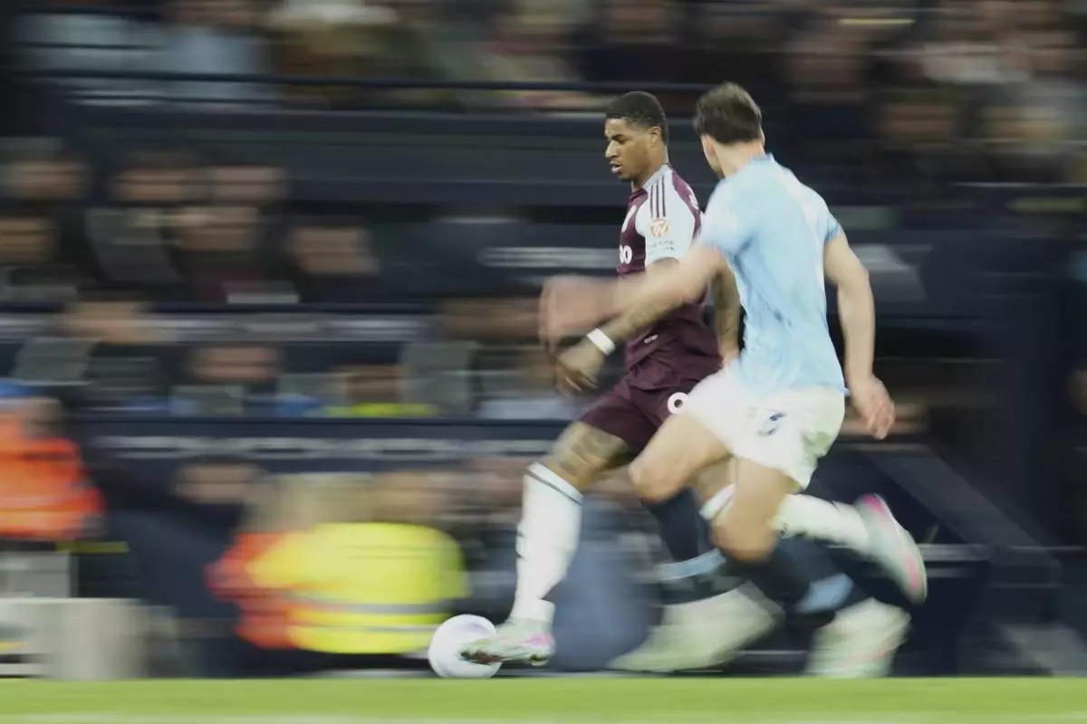 Aston Villa's Marcus Rashford in action during the English Premier League soccer match between Manchester City and Aston Villa at Etihad stadium in Manchester, England, Tuesday, April 22, 2025. (AP Photo/Jon Super)