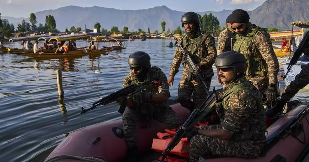 Indian military says Pakistani troops fired at positions along the border in disputed Kashmir