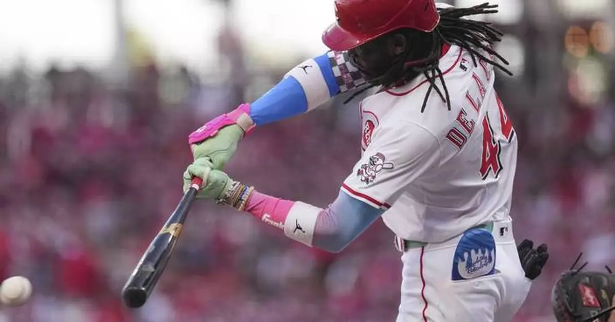 Martinez pitches 6 sparkling innings as the Reds beat the Cardinals 3-1 for their 5th straight win