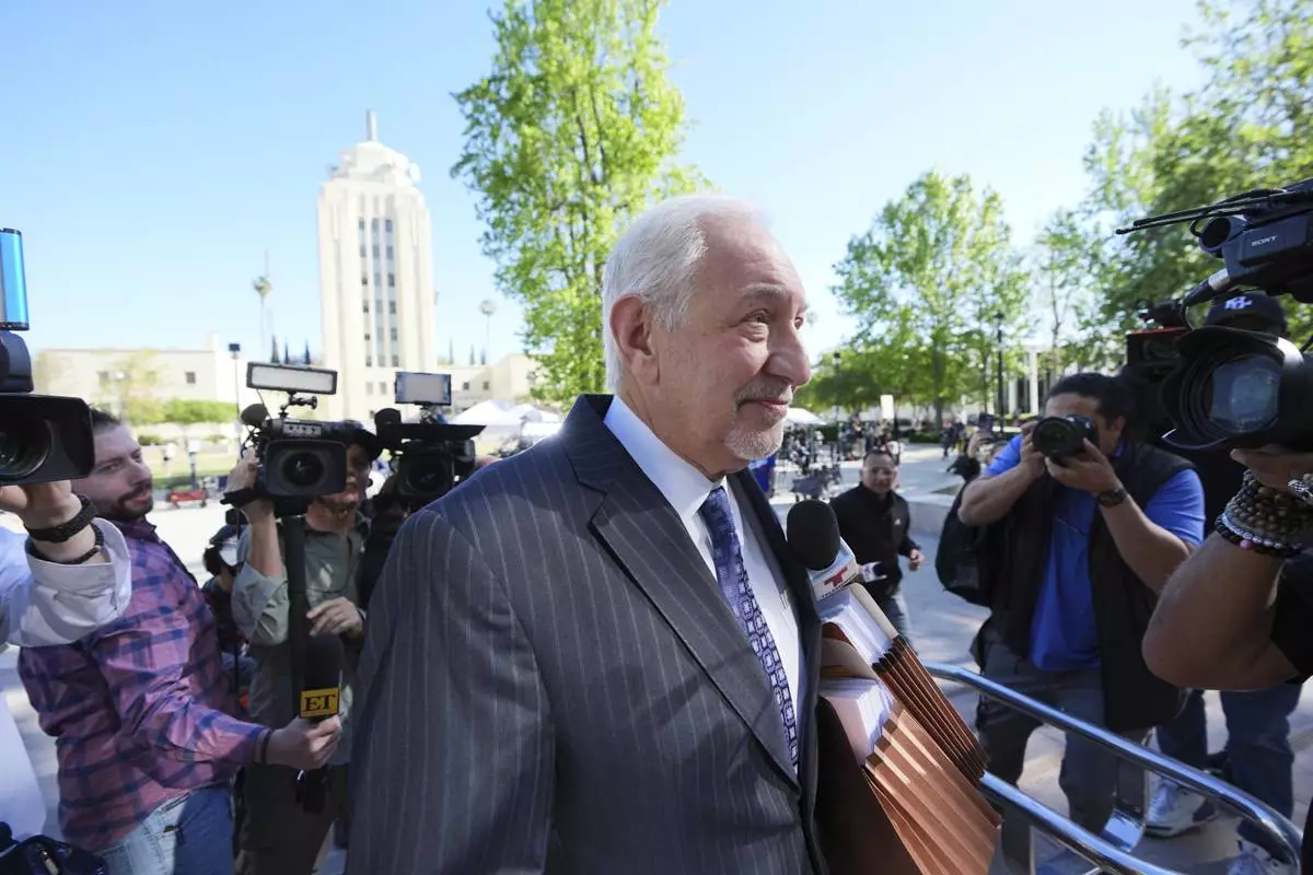 Attorney Mark Geragos arrives for a hearing regarding the case of Erik and Lyle Menendez Friday, April 11, 2025, in Los Angeles. (AP Photo/Damian Dovarganes)