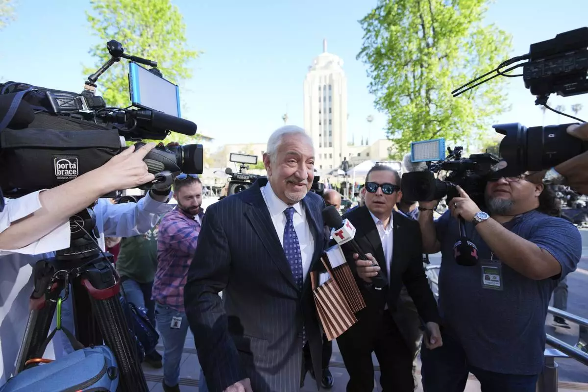 Attorney Mark Geragos arrives for a hearing regarding the case of Erik and Lyle Menendez Friday, April 11, 2025, in Los Angeles. (AP Photo/Damian Dovarganes)
