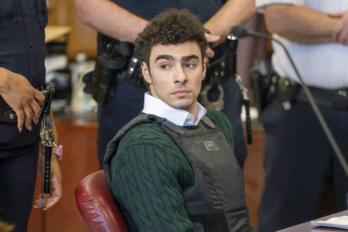 FILE - Luigi Mangione , accused of fatally shooting the UnitedHealthcare CEO Brian Thompson in New York City, appears in court for a hearing, Friday, Feb. 21, 2025, in New York. (Steven Hirsch/New York Post via AP, Pool, File)