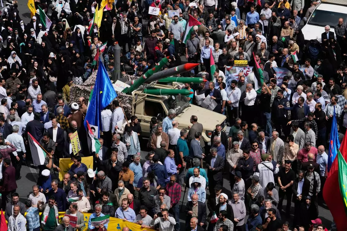 Replicas of some missiles are carried on a truck during an anti-Israel demonstration at the Felestin (Palestine) Sq. in Tehran, Iran, Wednesday, April 9, 2025. (AP Photo/Vahid Salemi)