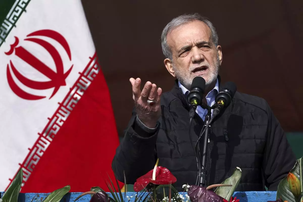 FILE - In this photo released by the Iranian Presidency Office, President Masoud Pezeshkian speaks during a rally commemorating anniversary of 1979 Islamic Revolution that toppled the late pro-U.S. Shah Mohammad Reza Pahlavi and brought Islamic clerics to power, in Tehran, Iran, Monday, Feb. 10, 2025. (Iranian Presidency Office via AP, file)