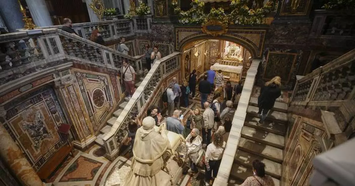 AP PHOTOS: The death of a pope begins a centuries-old ritual to elect his successor