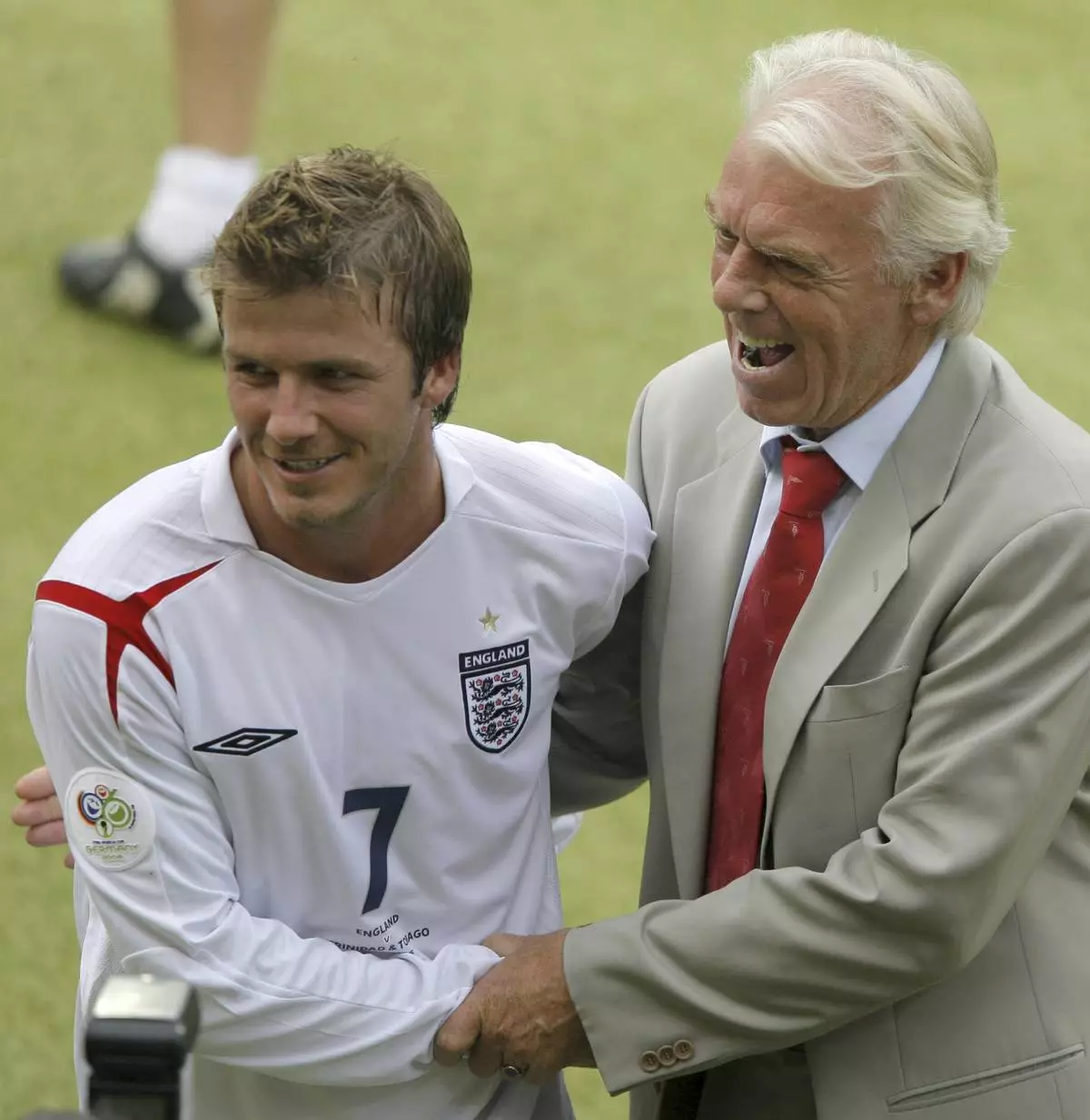 FILE - England's David Beckham shakes hands with Trinidad and Tobago's coach Leo Beenhakker, right, during their World Cup Group B soccer match in Nuremberg, Germany, Thursday, June 15, 2006. (AP Photo/Ivan Sekretarev, File)