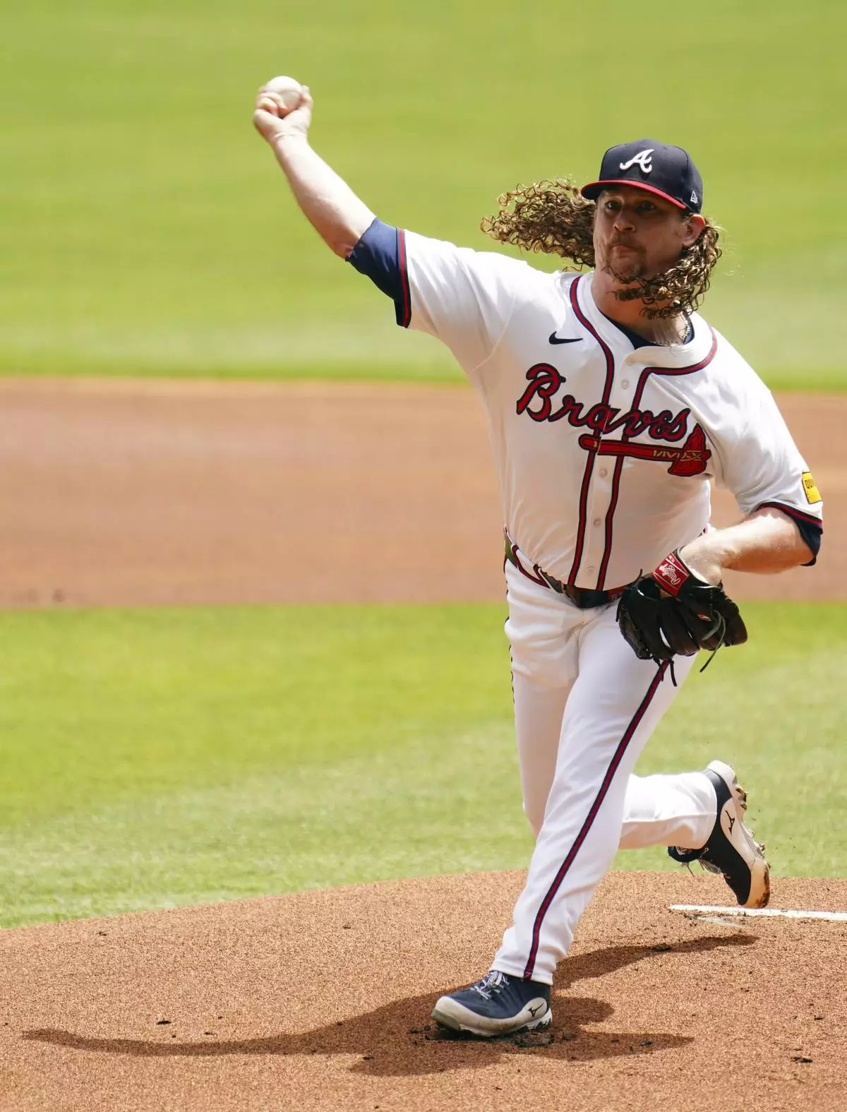 Atlanta Braves pitcher Grant Holmes (66) delivers a pitch against the Minnesota Twins during the first inning of a baseball game Saturday, April 20, 2025, in Atlanta. (AP Photo/John David Mercer)