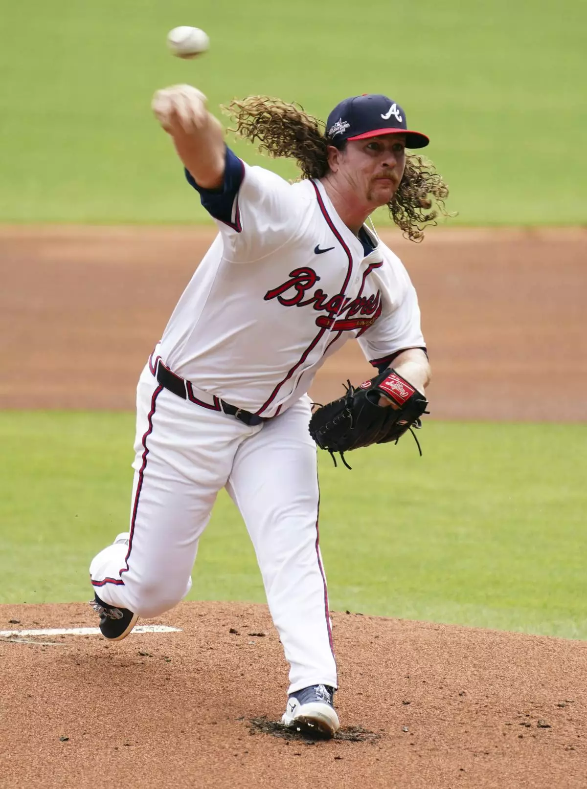 Atlanta Braves pitcher Grant Holmes (66) delivers a pitch against the Minnesota Twins during the first inning of a baseball game Saturday, April 20, 2025, in Atlanta. (AP Photo/John David Mercer)
