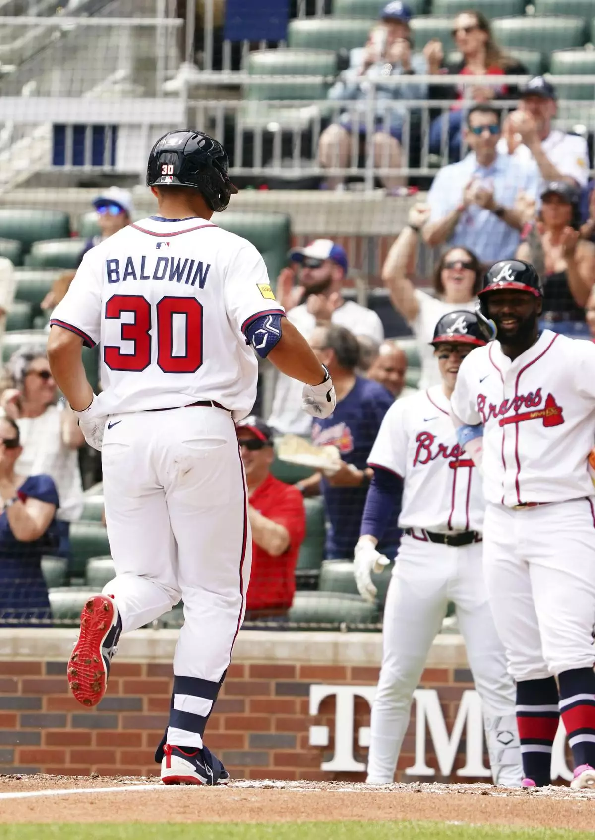 Atlanta Braves' Drake Baldwin (30) celebrates his two-run home run against the Minnesota Twins during the third inning of a baseball game Saturday, April 20, 2025, in Atlanta. (AP Photo/John David Mercer)